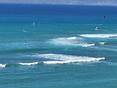 Kite surfers viewed from lanai
